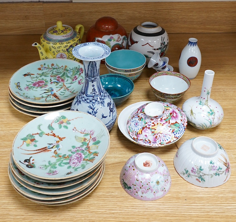 A group Oriental ceramics including Chinese famille rose plates, various tea bowls, a teapot, vases etc., tallest blue and white vase 21.5cm high (28). Condition - fair